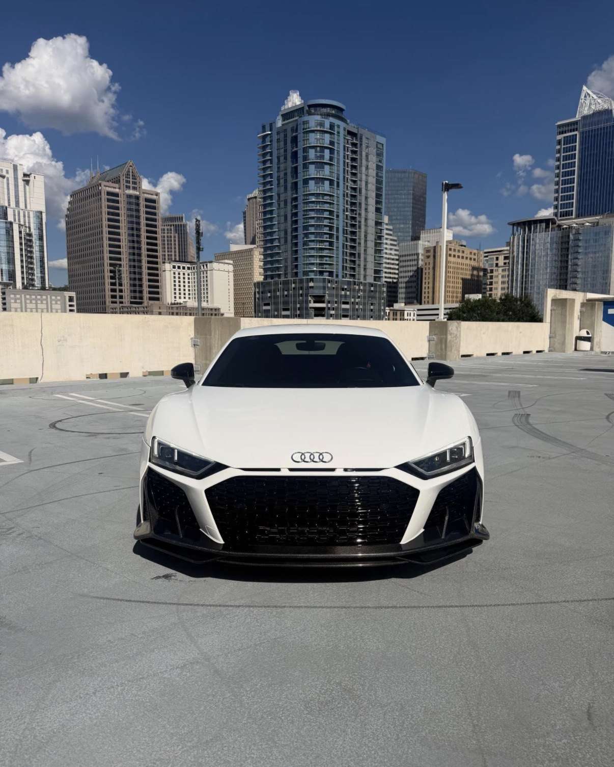 White Audi R8 on a Midtown Atlanta rooftop deck, straight front