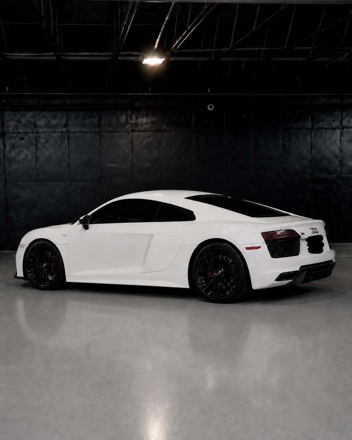 White Audi R8, rear three quarter in the studio