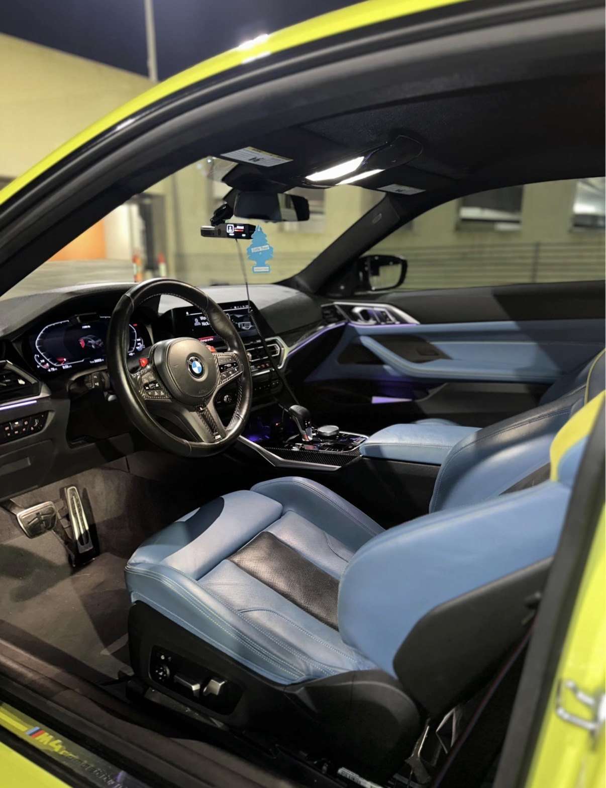 BMW M4 Competition cockpit, blue and black leather