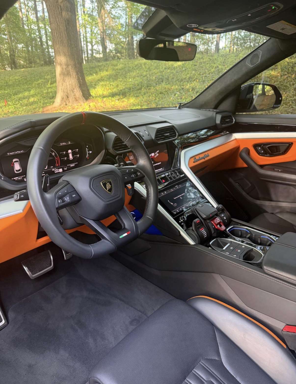 Lamborghini Urus S cockpit, grey leather with orange accents
