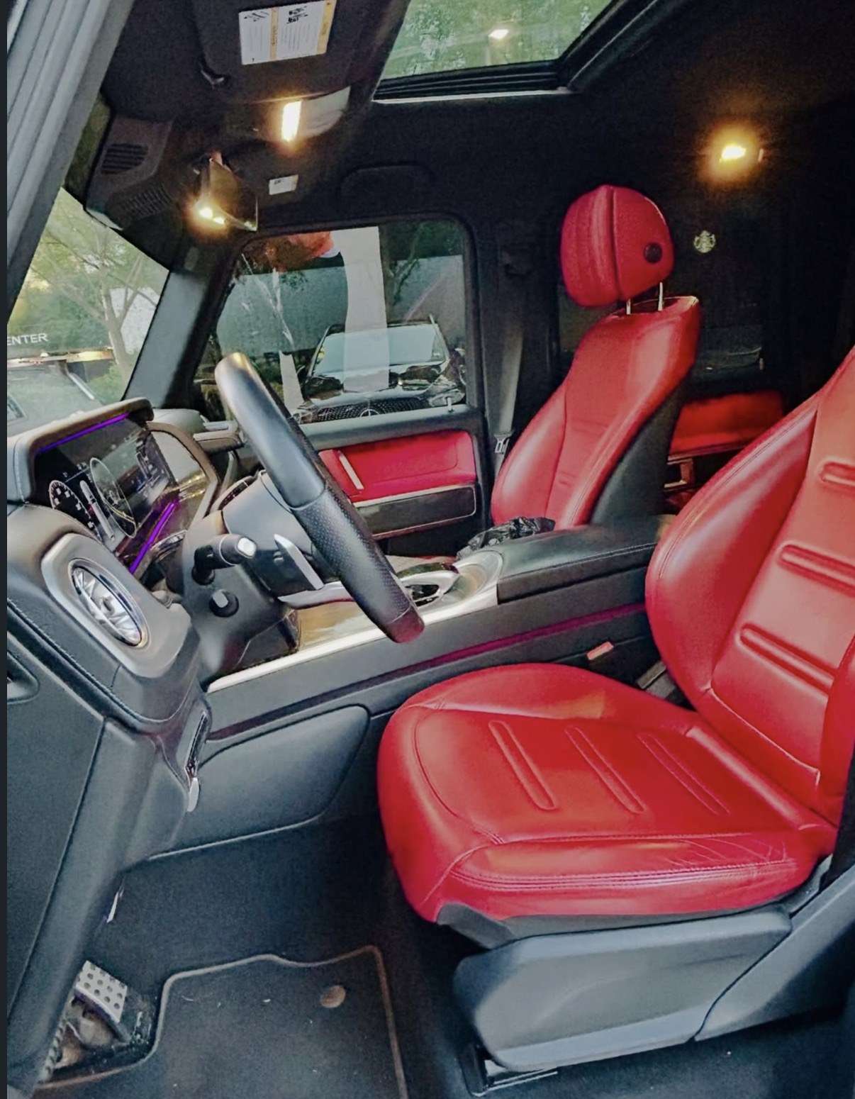 Red leather front seats and cockpit of the Mercedes G63